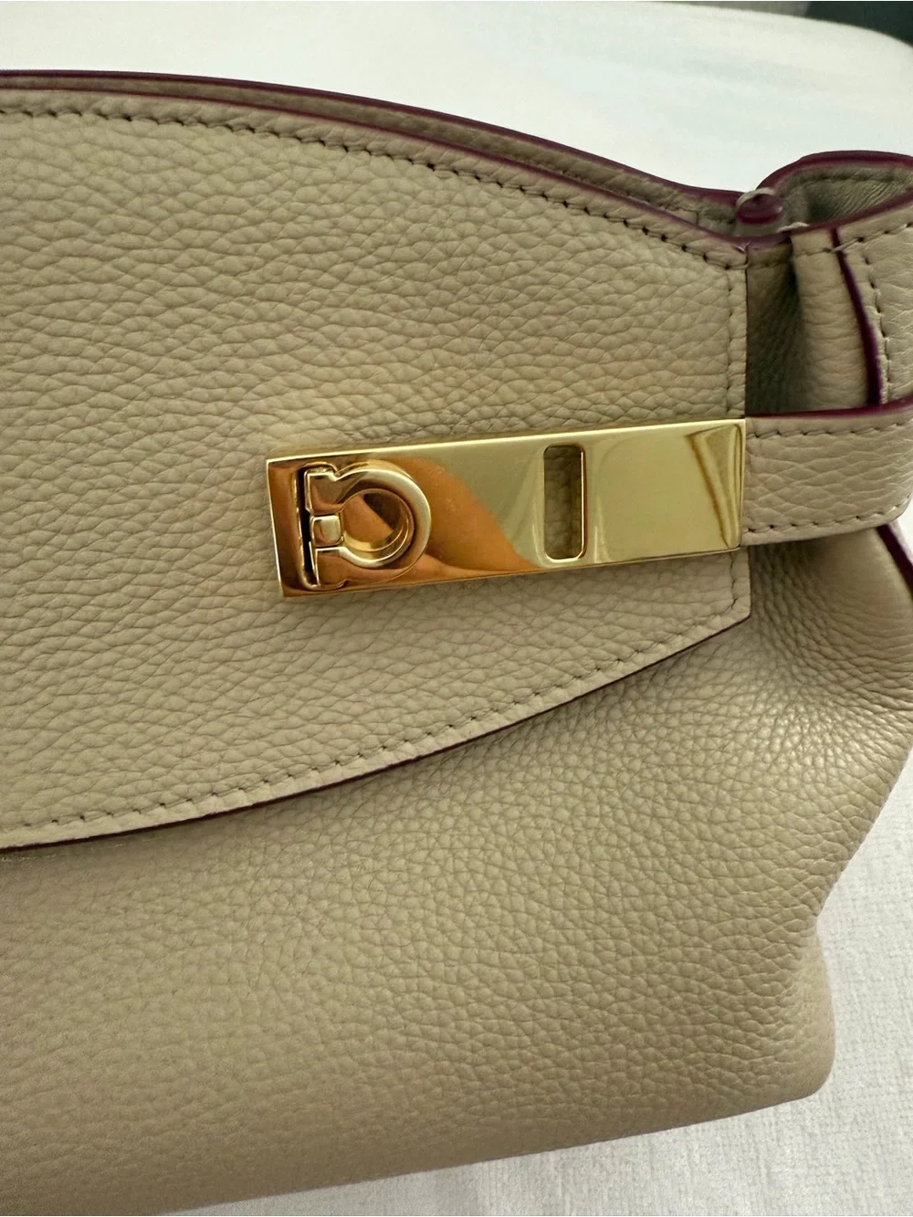 Ferragamo “XS Hug” Gold Hardware and Burgundy Trim